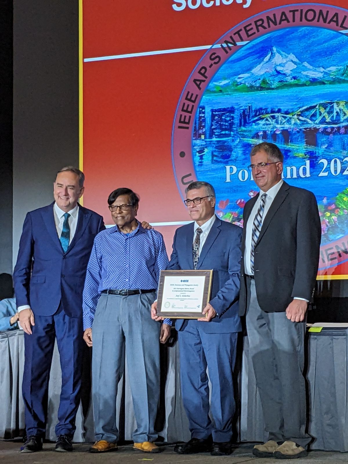 Dr. Elsherbeni with award